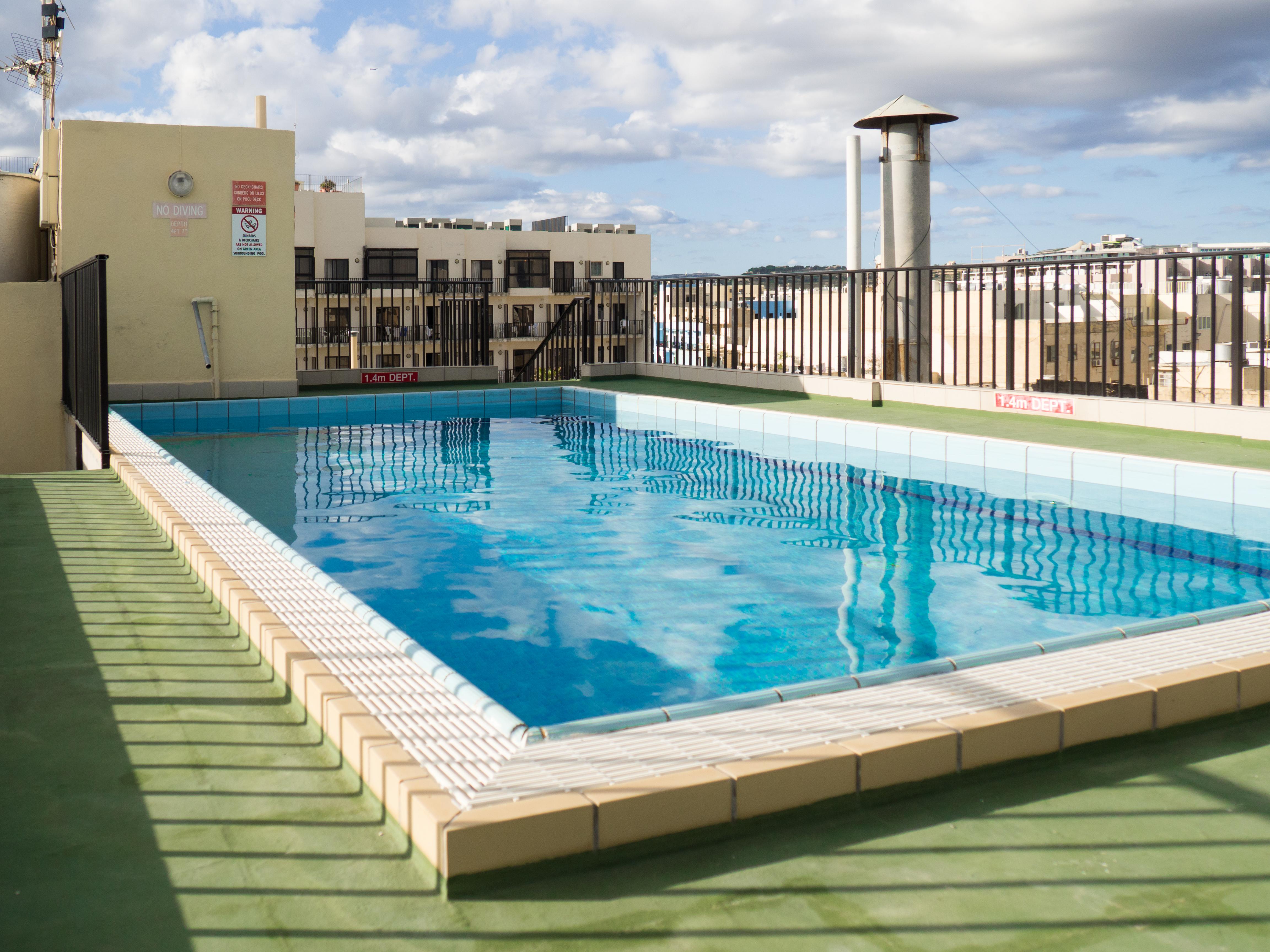 Huli Hotel & Apartments Qawra Extérieur photo