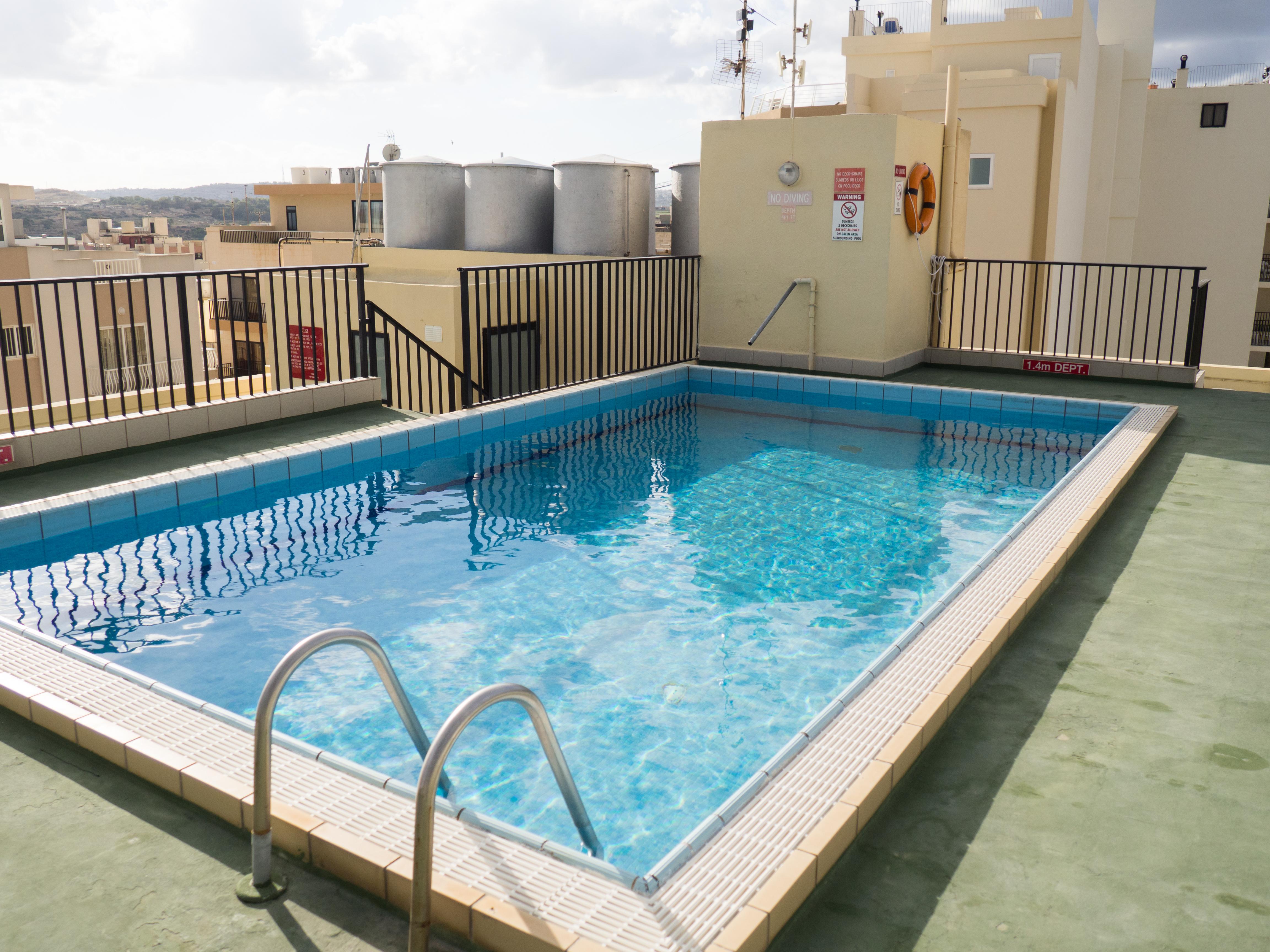 Huli Hotel & Apartments Qawra Extérieur photo