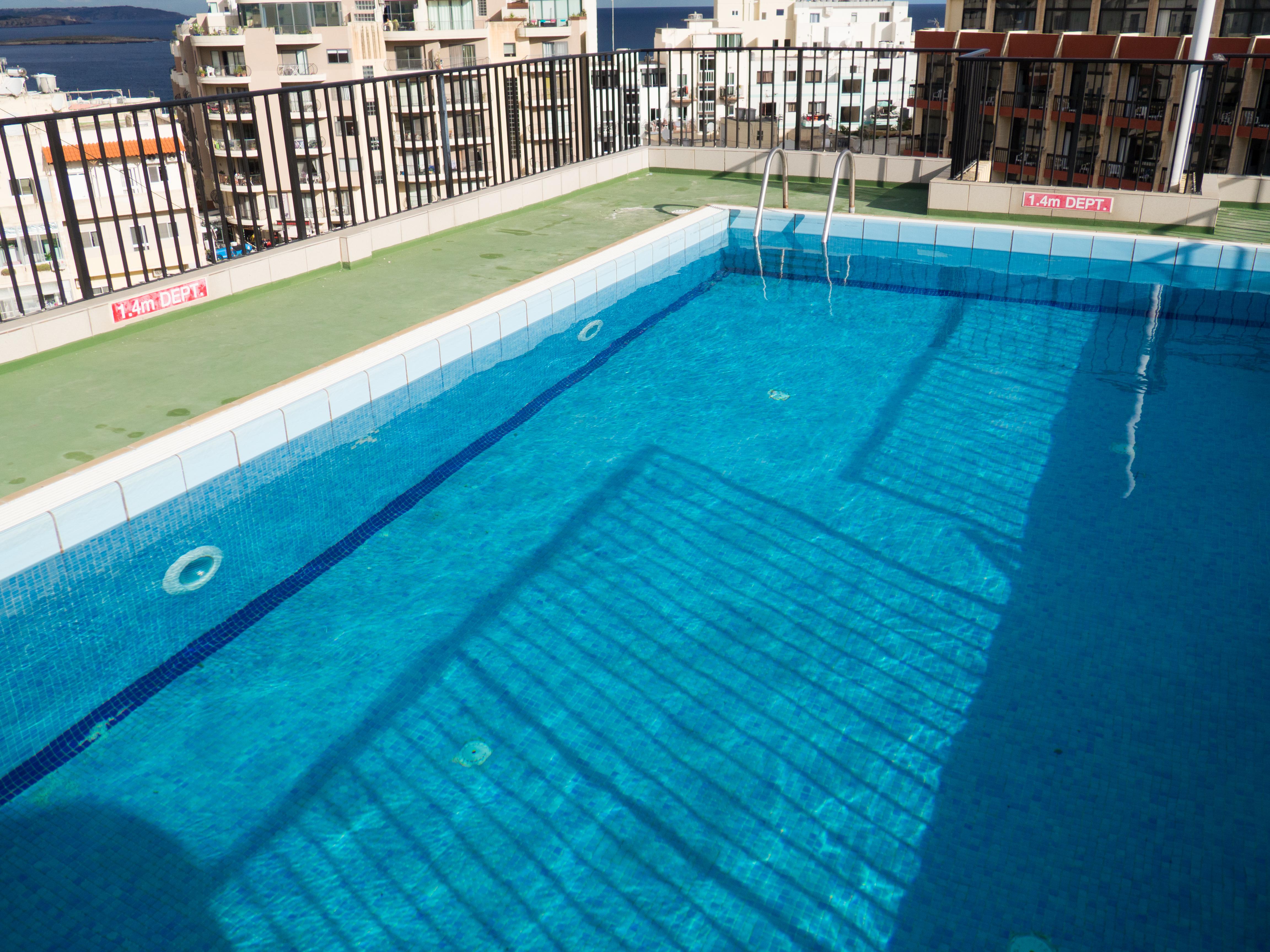 Huli Hotel & Apartments Qawra Extérieur photo