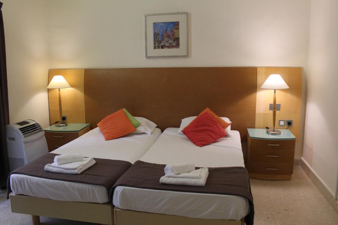 Huli Hotel & Apartments Qawra Extérieur photo