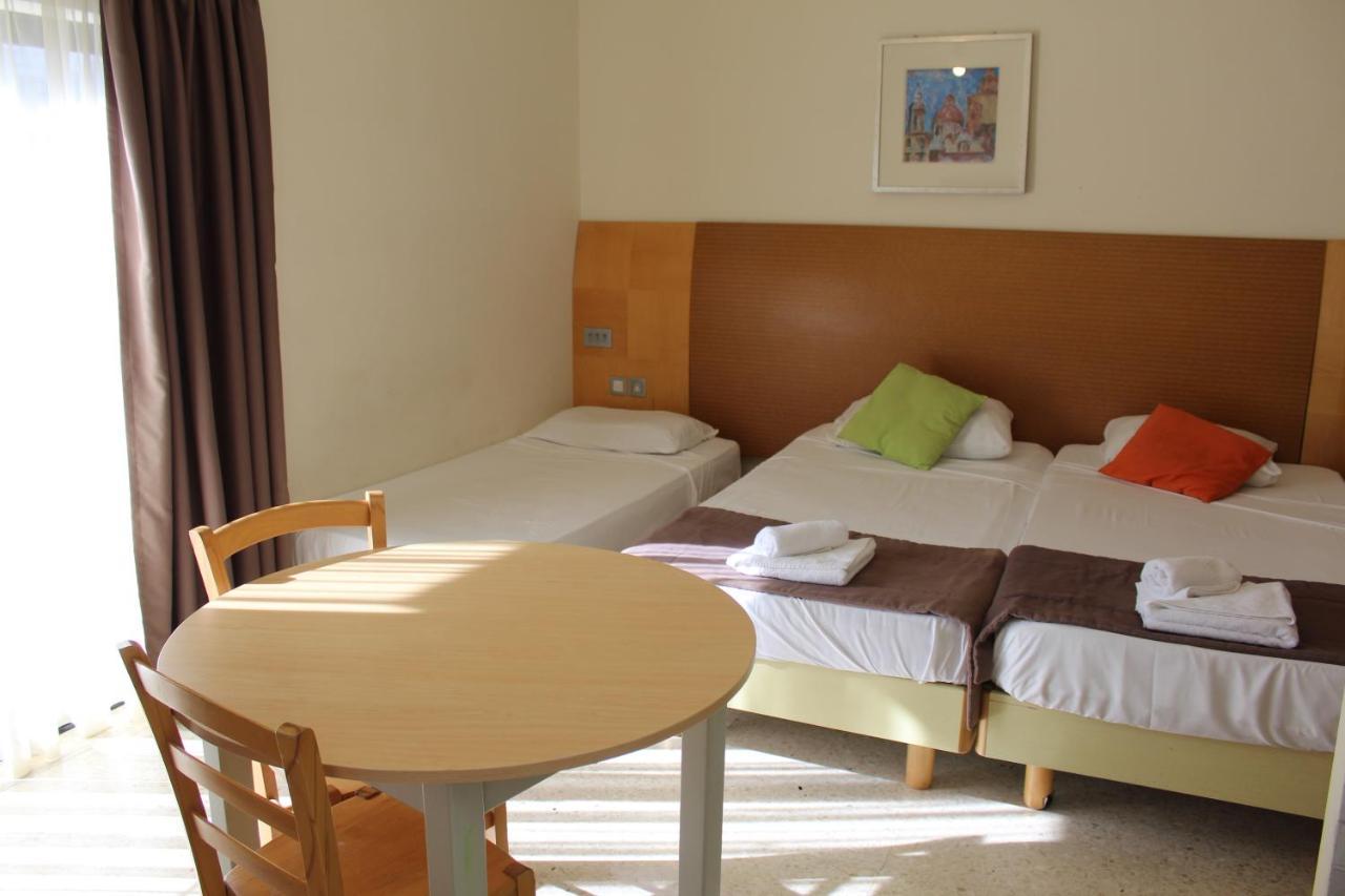 Huli Hotel & Apartments Qawra Extérieur photo