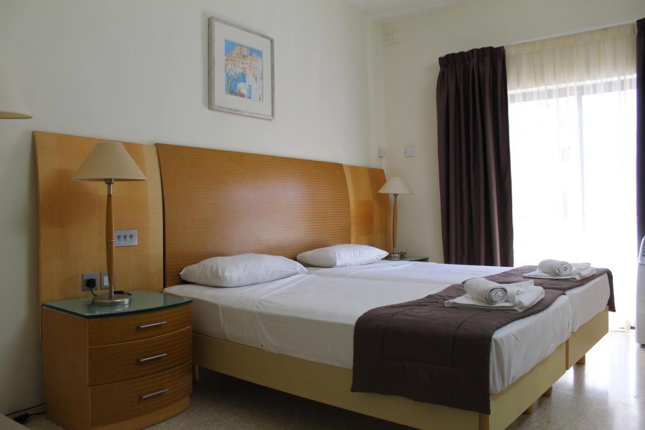 Huli Hotel & Apartments Qawra Extérieur photo