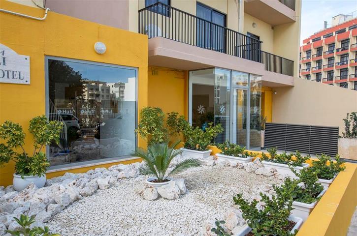 Huli Hotel & Apartments Qawra Extérieur photo