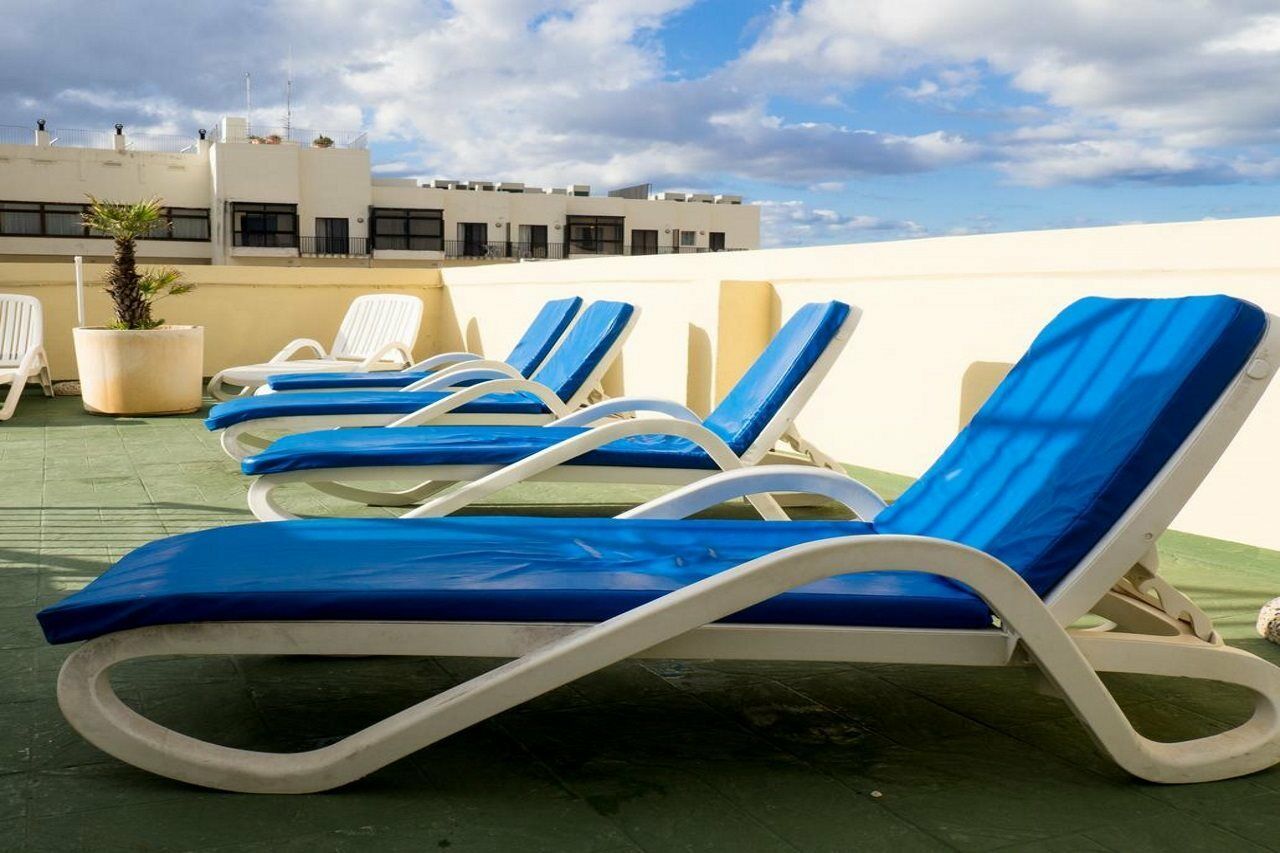 Huli Hotel & Apartments Qawra Extérieur photo